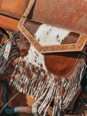 Shiloh Stables and Tack: This classy cowhide purse is the perfect  combination of vintage, western, and boho. This genuine hair-on cowhide  leather bag is lightweight, spacious, and features a beautiful color  combination